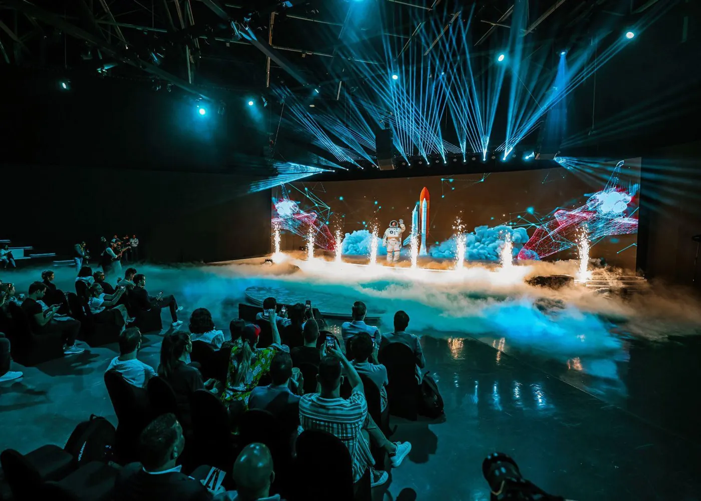 Audience watching the globe projection